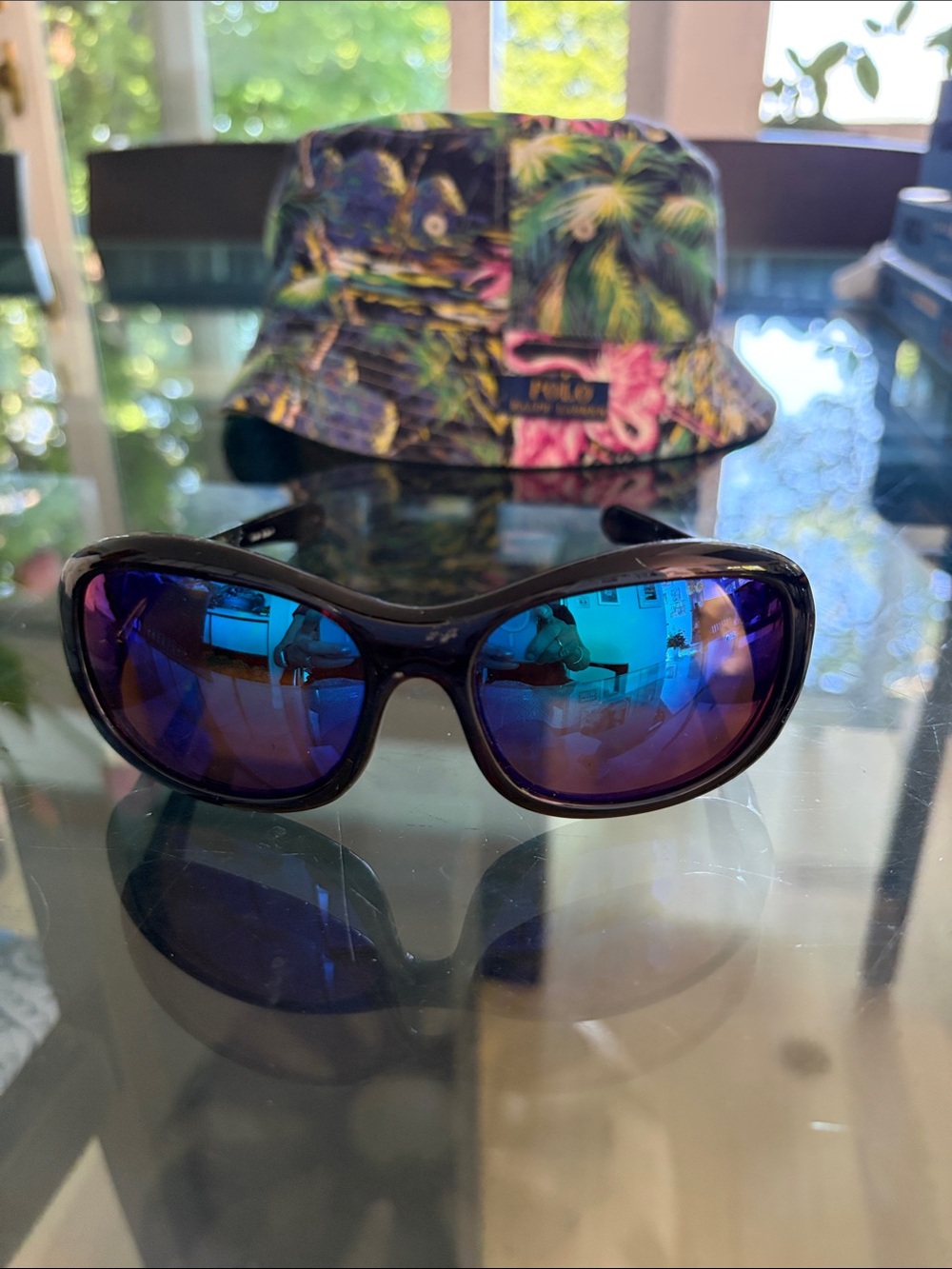 Oakley Women's Wrap Sunglasses with Blue Mirrored Lenses Eternally  Polarized